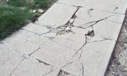 swimming pool construction who fixes a damaged sidewalk