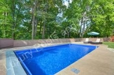 Fiberglass Pool with retractable cover open